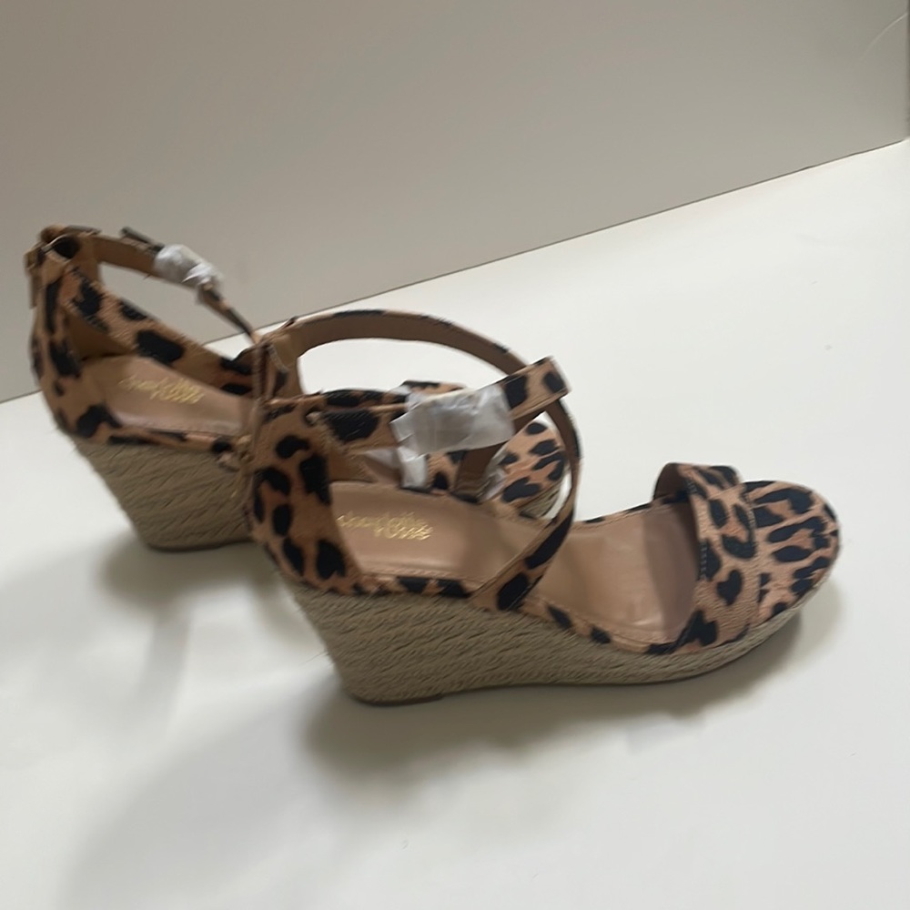 Leopard open toe wedges.